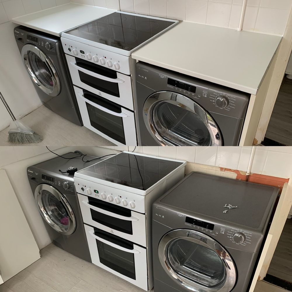 A washing machine, cooker and tumble dryer plumbed in along a kitchen worktop